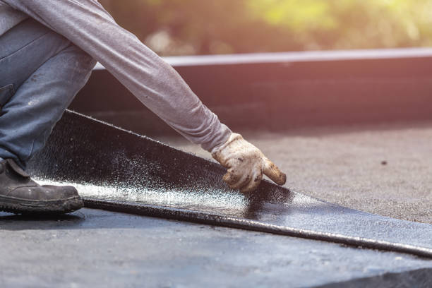 Professional Emergency Waterproofing technician working in Monterey, IN